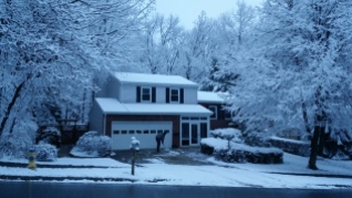 Ons huis in de sneeuw